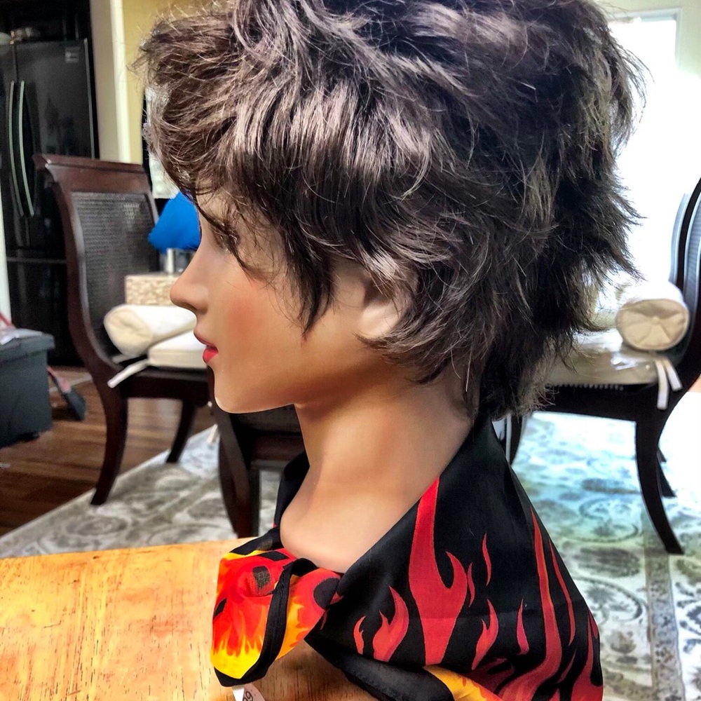 Very cute short brown wig.